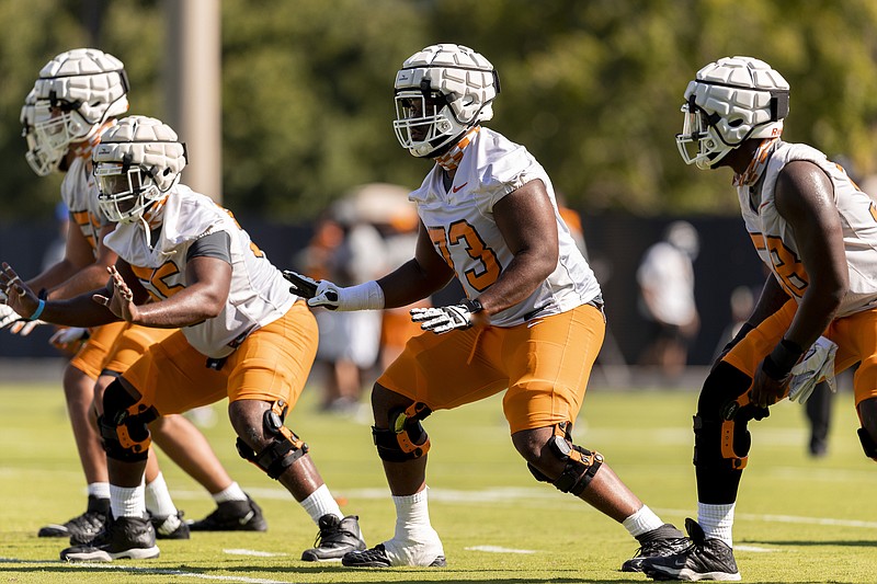 Tennessee Athletics photo by Andrew Ferguson / Preseason All-America guard Trey Smith (73) goes through the opening day of Tennessee's preseason camp Monday afternoon on Haslam Field in Knoxville.