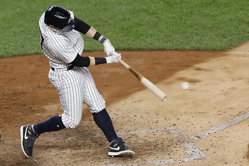 AP photo by Kathy Willens / New York Yankees designated hitter Clint Frazier connects for a single during the sixth inning of the team's game against the visiting Boston Red Sox on Sunday.