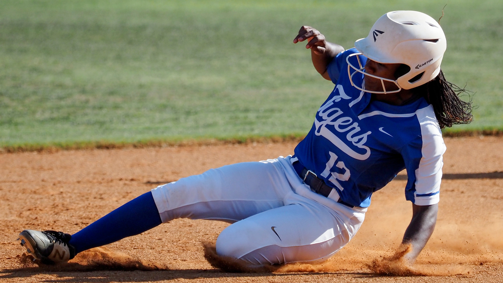Staff photo by C.B. Schmelter / Ringgold's Amber Gainer (12) slides into second against Coahulla Creek at Ringgold High School's Hazel Brown Field on Tuesday, Aug. 18, 2020 in Ringgold, Ga.