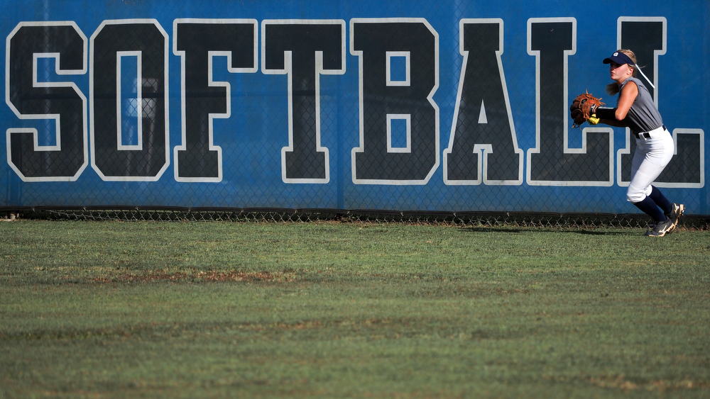 Staff photo by C.B. Schmelter / Coahulla Creek's McKinley Staten (10) throws the ball to the infield against Ringgold at Ringgold High School's Hazel Brown Field on Tuesday, Aug. 18, 2020 in Ringgold, Ga.