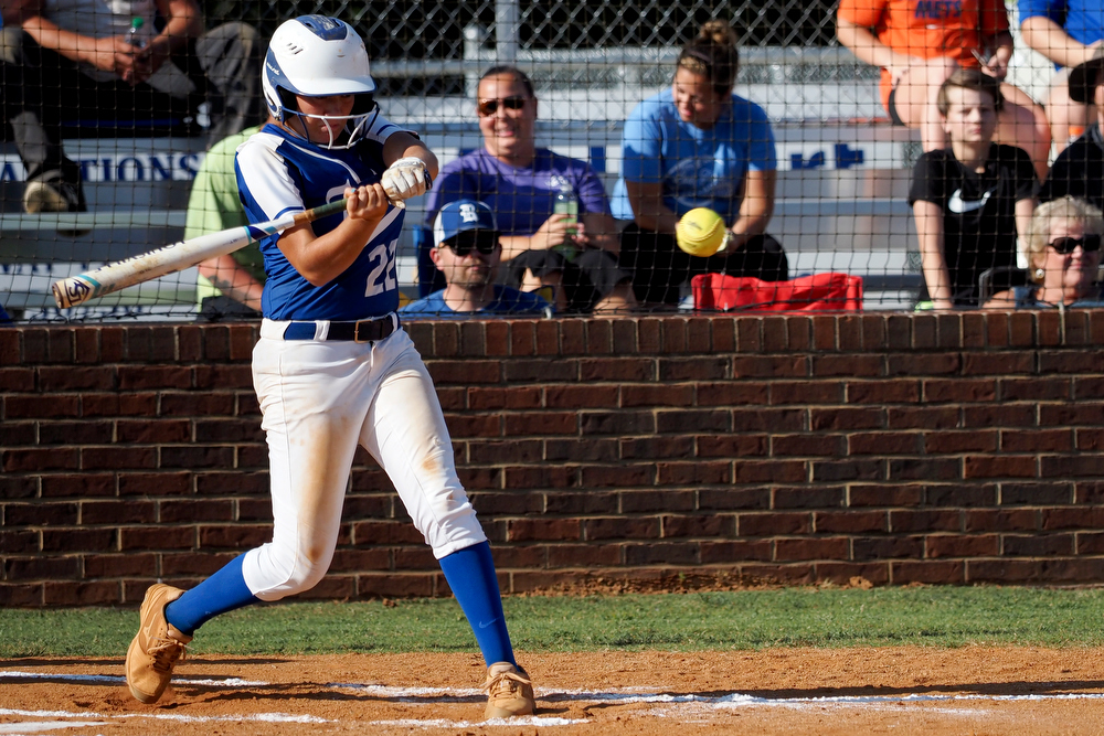 Staff photo by C.B. Schmelter / Ringgold's Caroline Hemphill (22) connects for a 2-run home run against Coahulla Creek at Ringgold High School's Hazel Brown Field on Tuesday, Aug. 18, 2020 in Ringgold, Ga.