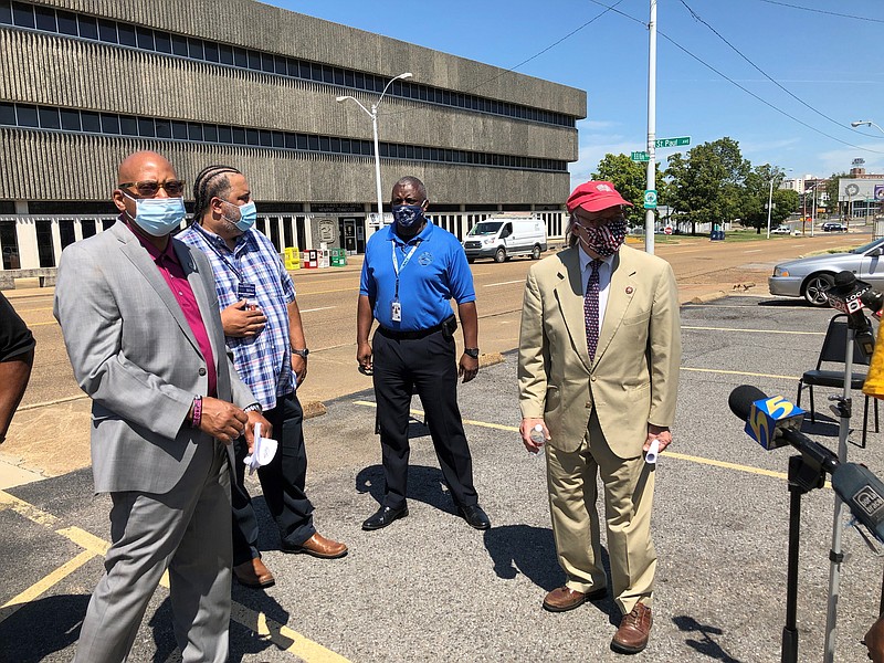 U.S. Rep. Steve Cohen, right, D-Tenn., stands alongside postal worker union representatives after a news conference about problems with the U.S. Postal Service on Tuesday, Aug. 18, 2020, in Memphis, Tenn. (AP Photo/Adrian Sainz)


