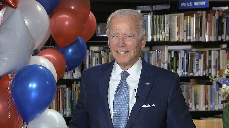 In this image from video, Democratic presidential candidate former Vice President Joe Biden smiles after the roll call vote during the second night of the Democratic National Convention on Tuesday, Aug. 18, 2020. (Democratic National Convention via AP)