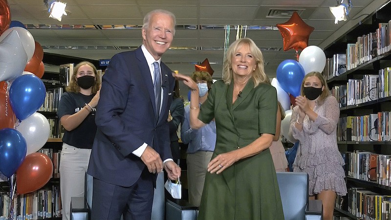 In this image from video, Democratic presidential candidate former Vice President Joe Biden, his wife Jill Biden, and members of the Biden family, celebrate after the roll call vote during the second night of the Democratic National Convention on Tuesday, Aug. 18, 2020. (Democratic National Convention via AP)