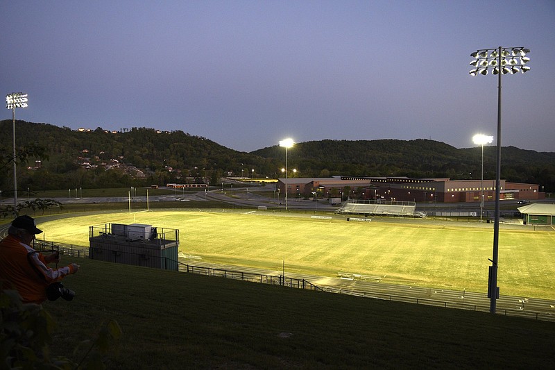 Staff photo by Robin Rudd / East Hamilton's Larry Henry Field glows under the lights on April 10, when several high school sports fields in the Chattanooga area were illuminated as a tribute to the athletes, and particularly the seniors, whose spring seasons were cut short by the COVID-19 pandemic.