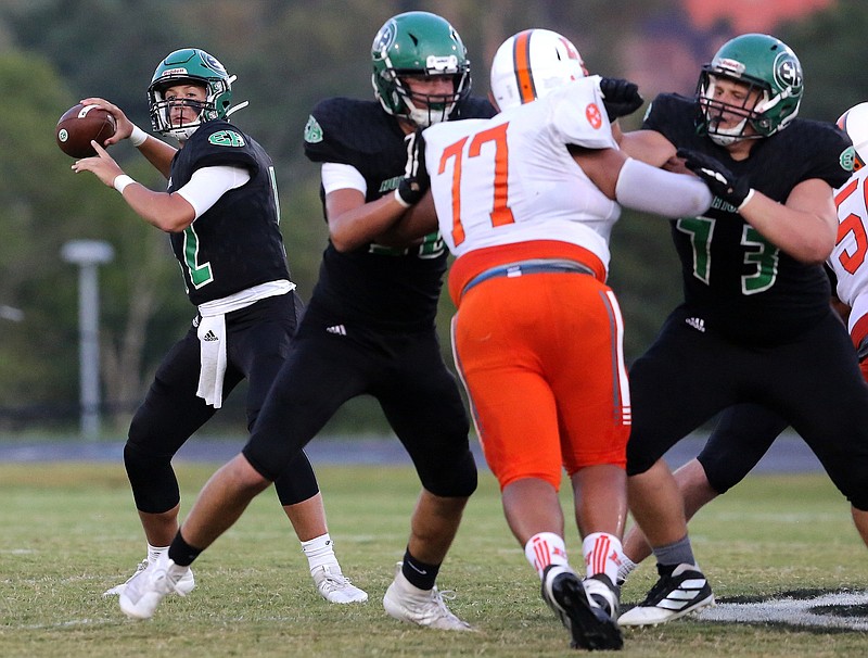 Staff file photo / The return of quarterback Haynes Eller, left, is one reason East Hamilton's offense can enter the season with confidence about its ability to strike quickly and often, putting up lots of points.