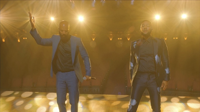 In this image from video, John Legend and Common perform "Glory" during the fourth night of the Democratic National Convention on Thursday, Aug. 20, 2020. (Democratic National Convention via AP)