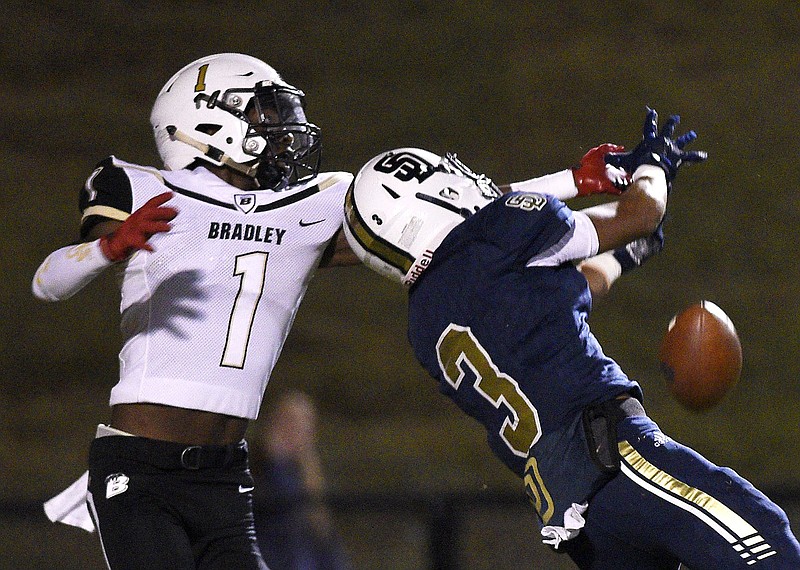 Staff photo by Robin Rudd / Bradley Central's Javon Burke (1) breaks up a pass intended for Soddy-Daisy's Kesean Eubanks during a game at Bradley Central on Oct. 24, 2019.