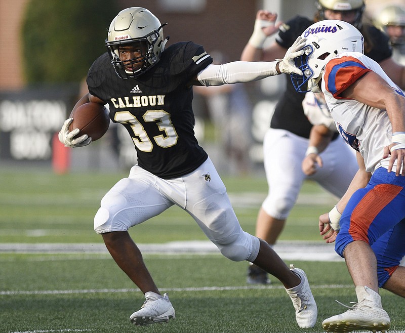 Staff photo by Robin Rudd / Calhoun's Jerrian Hames gets past a Northwest Whitfield defender during a scrimmage on Aug. 9, 2019, in Calhoun, Ga.