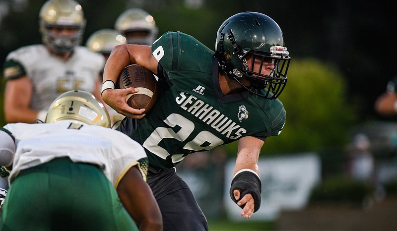 Photo by Cade Deakin / Silverdale Baptist Academy's Connor Delashmitt rambles through visiting Notre Dame's defense on Sept. 6, 2019. Delashmitt totaled nearly 1,200 yards of offense in just nine games last season as a sophomore.