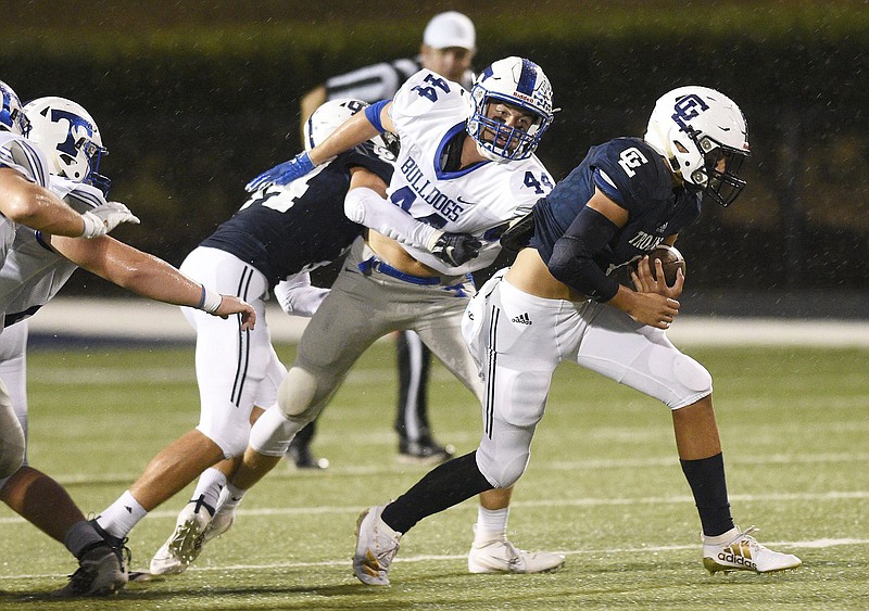 Staff photo by Robin Rudd / Gordon Lee's Brody Cobb, right, looks for running room after getting through Trion's defensive line during the teams' rivalry matchup on Sept. 20, 2019.