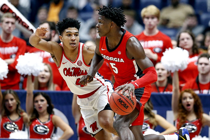 AP photo by Mark Humphrey / Georgia star Anthony Edwards, right, drives past Ole Miss guard Breein Tyree in an SEC tournament game on March 11 in Nashville. Edwards is one of the players considered the possible No. 1 pick for this year's NBA draft.