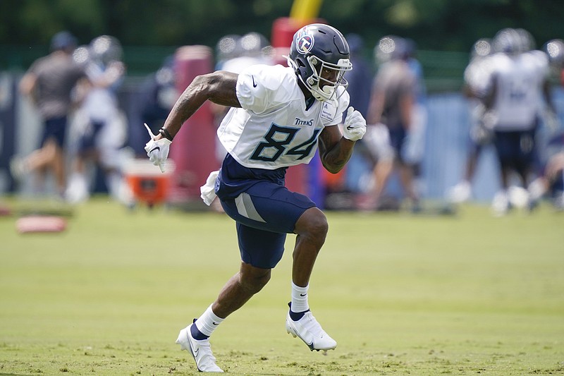 AP photo by Mark Humphrey / Tennessee Titans wide receiver Corey Davis runs a play during the team's training camp on Tuesday in Nashville. Davis, the No. 5 overall pick in 2017, is in the final season of his rookie contract after the Titans declined to pick up his fifth-year option.