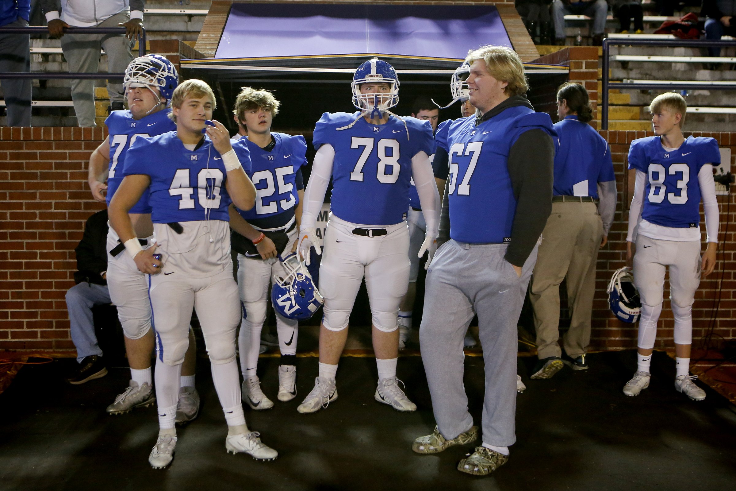 Staff photo by C.B. Schmelter / McCallie's Austin Gentle (78) and his teammates wait before taking the field for warmups before the Division II-AAA BlueCross Bowl state championship against MBA at Tennessee Technological University's Tucker Stadium on Thursday, Dec. 5, 2019 in Cookeville, Tenn.