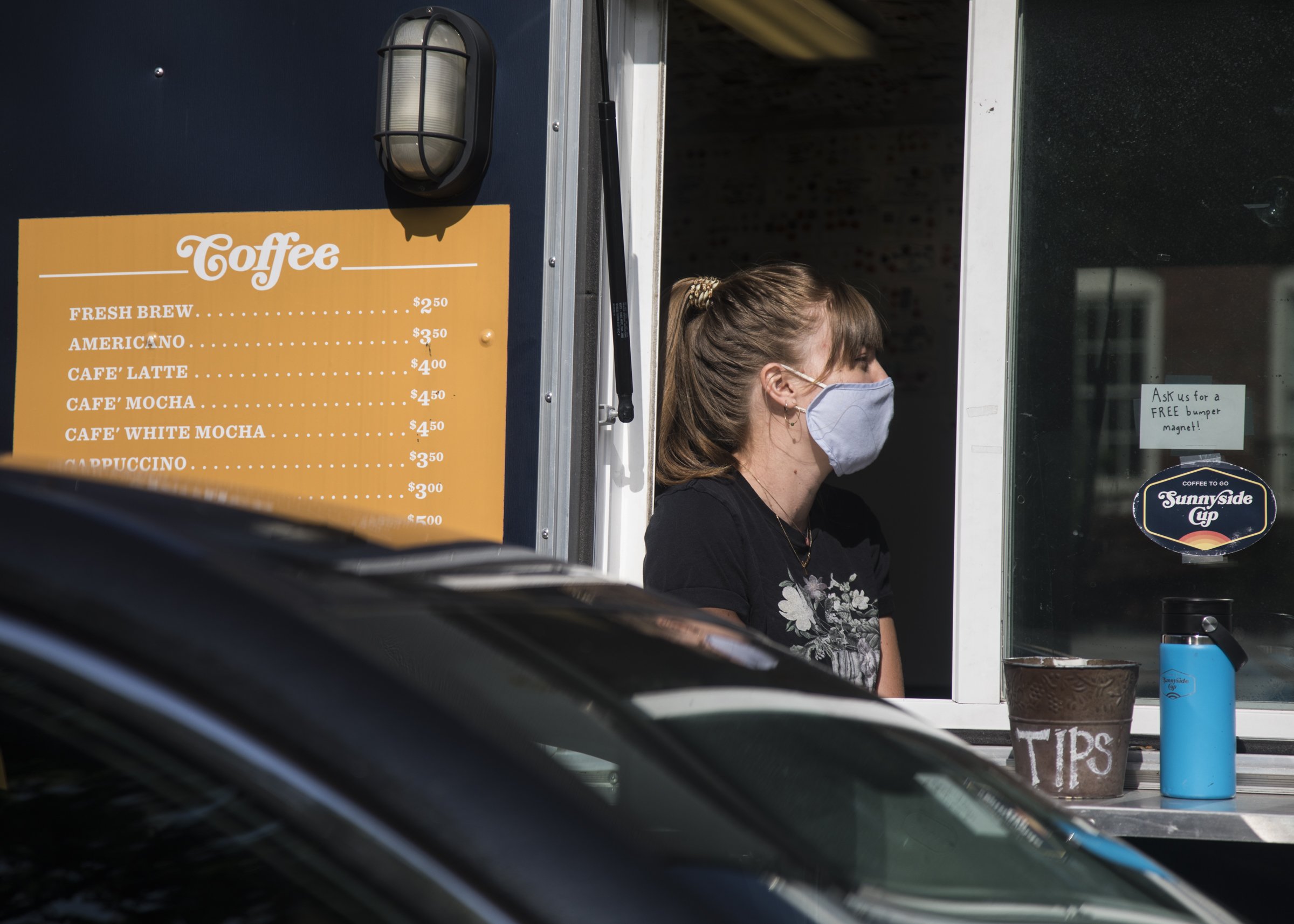 Staff photo by Troy Stolt / Barista Marah Bates takes a customer's order at Sunnyside Cup's location at 3008 South Broad St. on Wednesday. The to-go coffee shop recently announced it will be opening a new location on Signal Mountain Road.