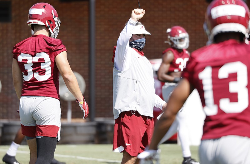 Alabama photo by Kent Gidley / Pete Golding, who is in his second year as Alabama's defensive coordinator, gives instructions to his players during practice this week in Tuscaloosa.