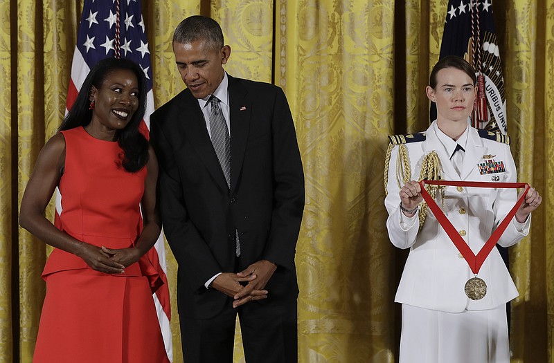 Photo by Carolyn Kaster of The Associated Press / In this Sept. 22, 2016 file photo, President Barack Obama awards journalist and author, Isabel Wilkerson, the 2015 National Humanities Medal during a ceremony in the East Room of the White House, in Washington. Wilkerson's new book, "Caste," takes on what she is calling the country's caste system.