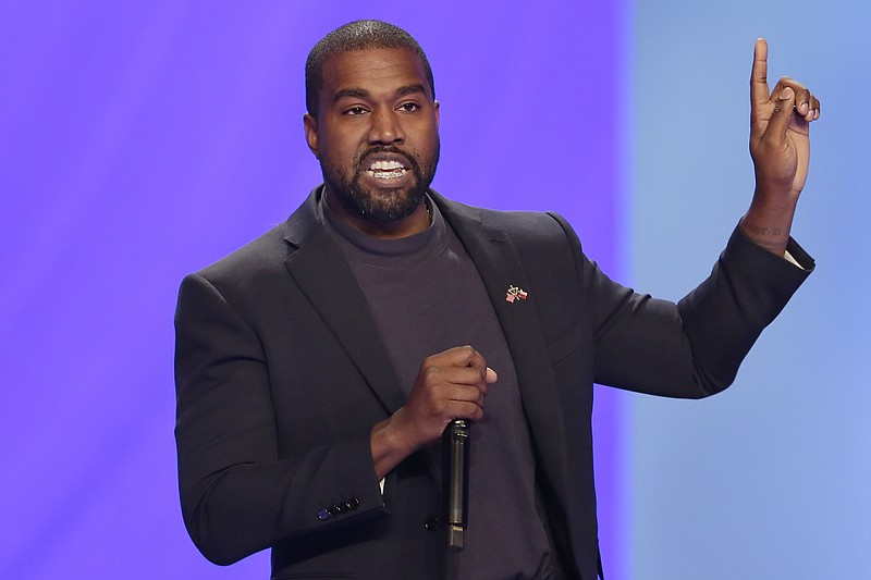 In this Sunday, Nov. 17, 2019, file photo, Kanye West answers questions during a service at Lakewood Church, in Houston. Staff for the Wisconsin Elections Commission are recommending that rapper Kanye West be kept off the battleground state's presidential ballot in November 2020 because he missed a deadline to submit nomination papers. (AP Photo/Michael Wyke, File)