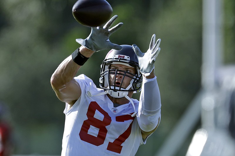 AP photo by Chris O'Meara / Tampa Bay Buccaneers tight end Rob Gronkowski (87) catches a pass during a Tampa Bay Buccaneers workout on Aug. 13 in Tampa, Fla.