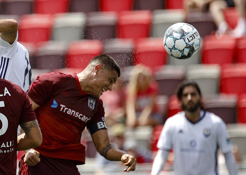 Staff photo by Troy Stolt / Chattanooga Red Wolves forward Ricardo Zacarias heads the ball on goal during Saturday's match against South Georgia Tormenta FC at CHI Memorial Stadium in East Ridge.