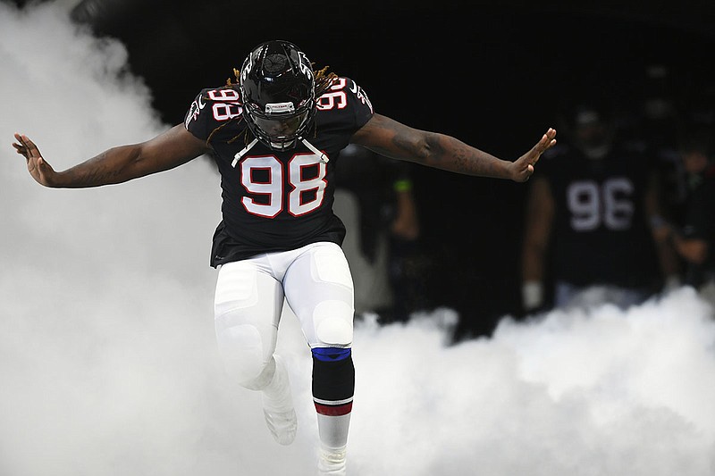 AP photo by John Amis / Atlanta Falcons defensive end Takk McKinley takes the field before a home game against the Tennessee Titans on Sept. 29, 2019.