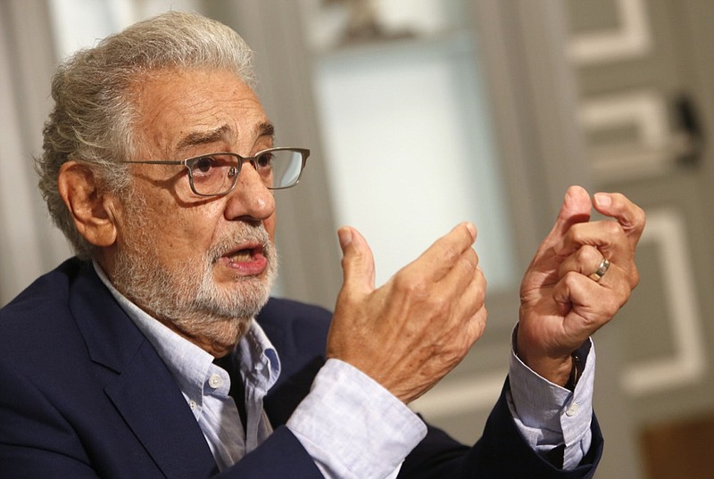 Spanish tenor Placido Domingo gestures as he answer a question during an interview with the Associated Press in Naples, Sunday, Aug. 23, 2020. Opera legend Placido Domingo denied ever abusing his power during his management tenure at two U.S. opera houses, as he embarks on a full-throttle campaign to clear his name after two investigations found credible accusations he had engaged with ''inappropriate conduct'' with multiple women over a period of decades. (AP Photo/Riccardo De Luca)