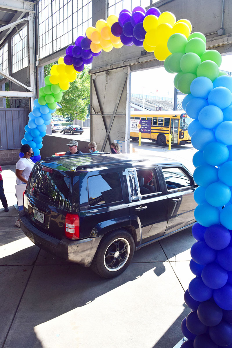Staff Photo by Robin Rudd / Cars exited the pavilion through a balloon archway.