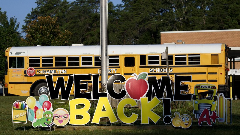 Staff photo by C.B. Schmelter / A "Welcome Back!" sign sits in the grass at Hixson Elementary School on the first day of school, Wednesday, Aug. 12, 2020 in Hixson, Tenn.