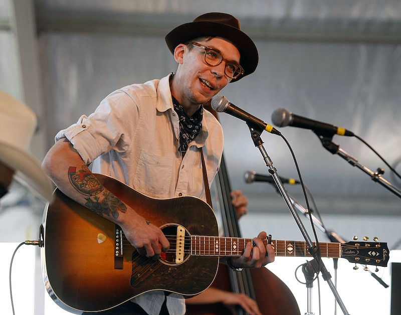In this July 31, 2011 file photo, singer-songwriter Justin Townes Earle performs at the Newport Folk Festival in Newport, R.I. Earle, a leading performer of American roots music known for his introspective and haunting style, has died at age 38. New West Records publicist Brady Brock confirmed his death, but did not immediately provide details. Earle was the son of country star Steve Earle. (AP Photo/Joe Giblin, file)