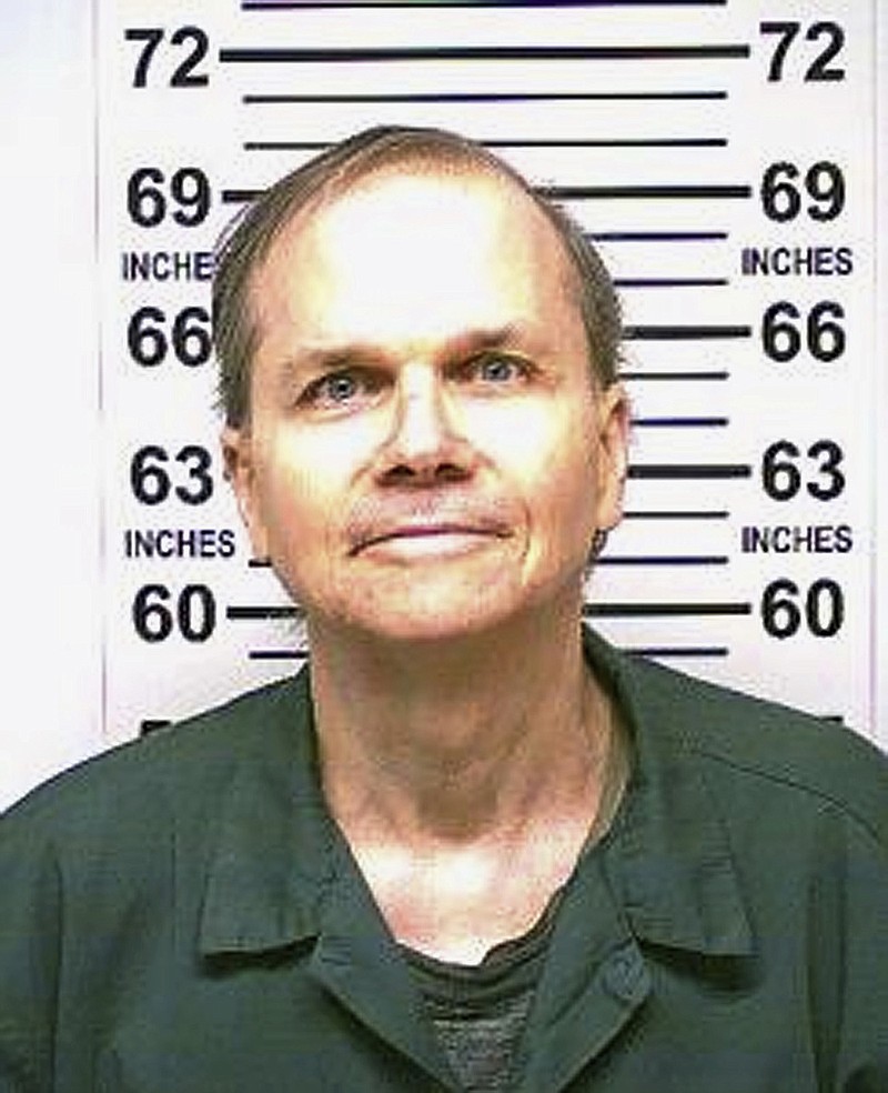 FILE — This Jan. 31, 2018 photo, provided by the New York State Department of Corrections, shows Mark David Chapman, the man who killed John Lennon. Chapman, 65, was denied parole for an 11th time, New York state corrections officials said Wednesday, Aug. 26, 2020. (New York State Department of Corrections via AP, File)