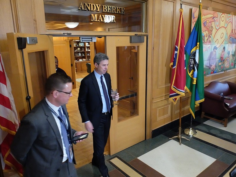 Staff photo by Tim Barber/ Emerging from his office on the third floor of City Hall in Chattanooga, Mayor Andy Berke prepares to announce an executive order to halting large gatherings, including entertainment shows at the Tivoli, Friday morning, Mar. 13, 2020.