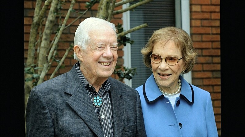 In this image from video, former President Jimmy Carter and former first lady Rosalynn Carter, seen in a photo as they speak on audio only, during the second night of the Democratic National Convention on Tuesday, Aug. 18, 2020. (Democratic National Convention via AP)


