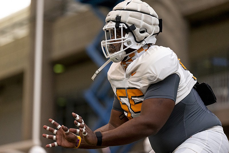 Tennessee Athletics photo by Andrew Ferguson / Tennessee senior center Brandon Kennedy works out during an indoor practice this past week to continue his preparation for a sixth season of eligibility.