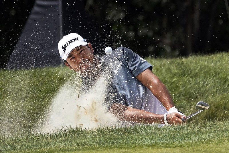 AP photo by Charles Rex Arbogast / Hideki Matsuyama hits out of a bunker for an eagle on the first hole at Olympia Fields Country Club during Saturday's third round of the BMW Championship, the pentultimate event in the PGA Tour's FedEx Cup playoffs.
