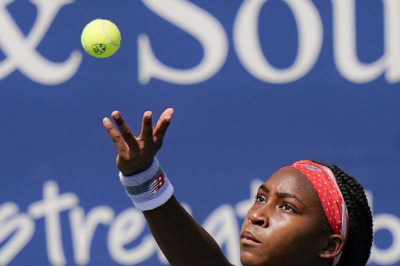 AP photo by Frank Franklin II / Coco Gauff serves to Maria Sakkari at the Western & Southern Open on Aug. 22 in New York.
