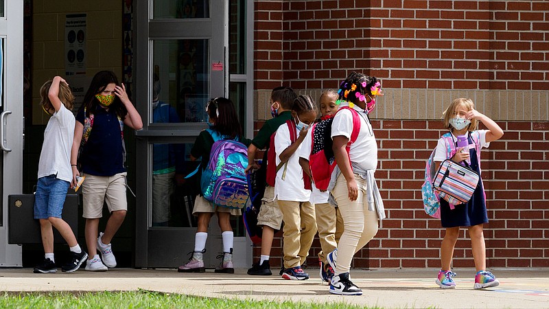 Staff photo by C.B. Schmelter / Students leave Battle Academy on Monday, Aug. 31, 2020 in Chattanooga, Tenn. Monday marked the first day of a two week trial period for Hamilton County Schools' Phase 3 scheduling.