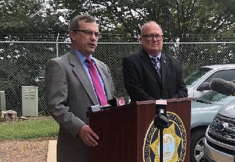 Staff photo by Rosana Hughes / District Attorney General Neal Pinkston, left, and cold case unit supervisor Mike Mathis speak at a news conference on Aug. 31, 2020.
