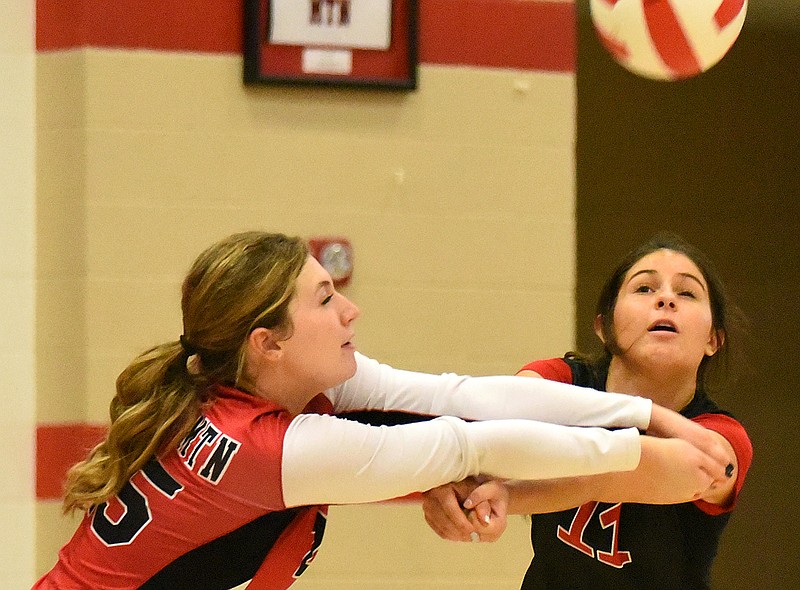 Staff Photo by Matt Hamilton / Signal Mountain's Emalee Grace Rowe, left, and Antoinette Cisto return a serve during Tuesday's 3-2 home win against Hixson.