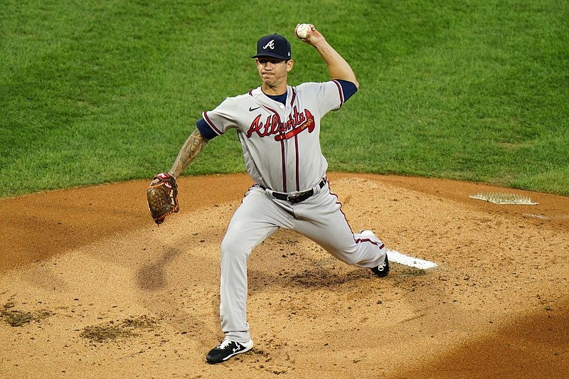 Atlanta Braves' Tommy Milone pitches during the first inning of a baseball game against the Philadelphia Phillies, Sunday, Aug. 30, 2020, in Philadelphia. (AP Photo/Matt Slocum)