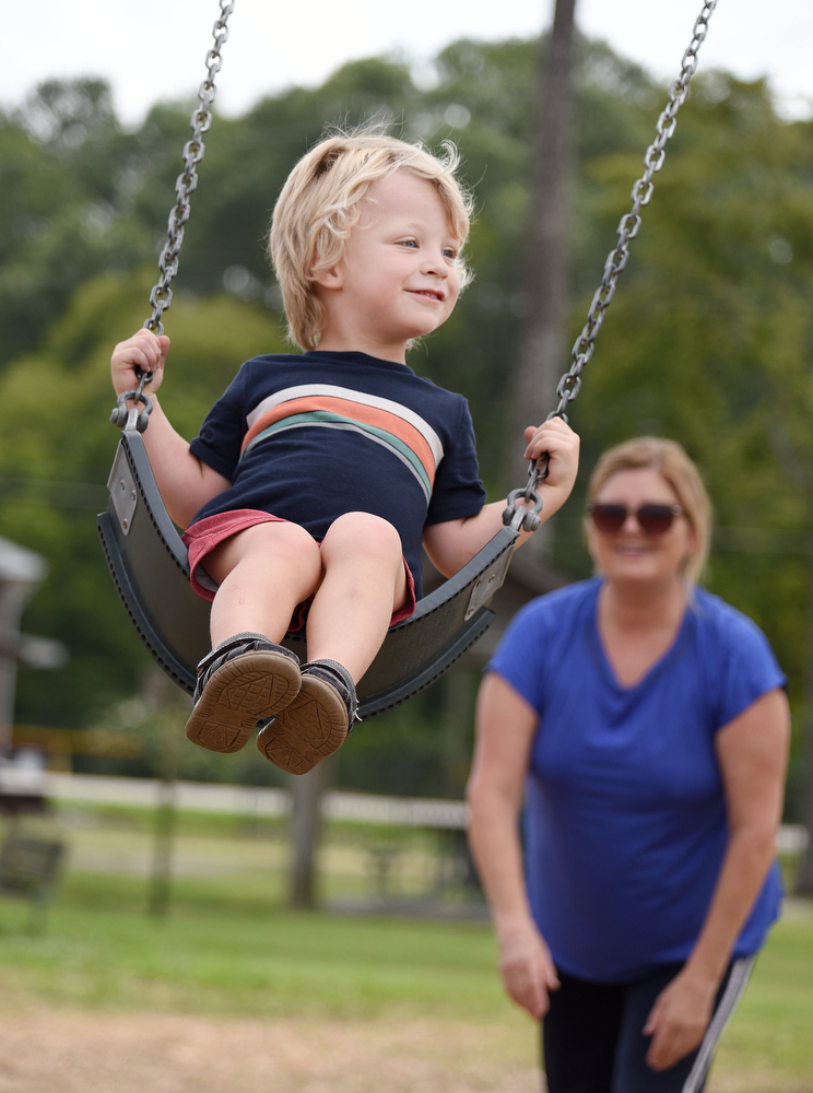 Staff photo by Matt Hamilton / Sara Gillian of Ringgold pushes her grandson Hunter Ott, 3, in a swing at Fort Oglethorpe's Gilbert-Stephenson Park.