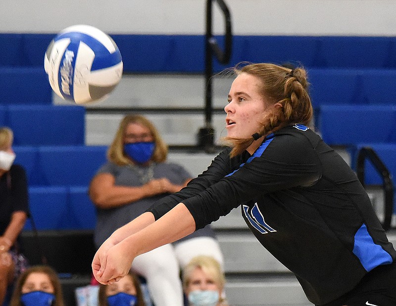 Staff Photo by Matt Hamilton / GPS senior libero Kylie Barry digs the volleyball during Wednesday's home sweep of East Hamilton. Barry finished the match with 12 digs and four aces.