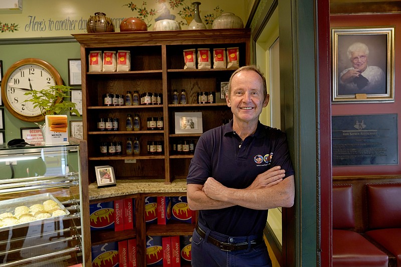 Chicago Alderman Tom Tunney poses inside his main Ann Sather restaurant, Tuesday, Sept. 1, 2020, in Chicago. Tunney estimates he's put $250,000 of his own money into running his three Ann Sather restaurants. (AP Photo/Charles Rex Arbogast)