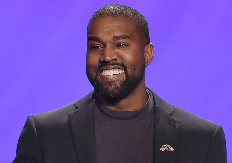 This Nov. 17, 2019, file photo shows Kanye West on stage during a service at Lakewood Church in Houston.  (AP Photo/Michael Wyke, File)