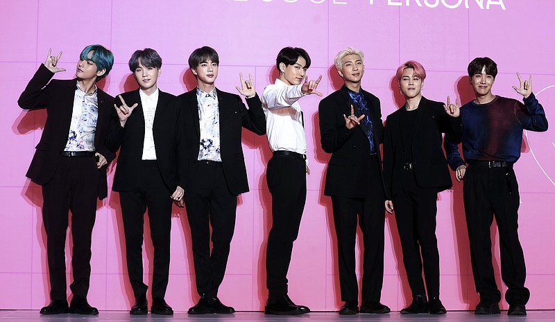 Members of South Korean K-Pop group BTS appear during a press conference in Seoul, South Korea, on April 17, 2019. "Dynamite," the group's first all-English song, debuted at No. 1 on the U.S. music charts this week, making BTS first Korean pop act to top the chart. (Jo Soo-jung/Newsis via AP, File)