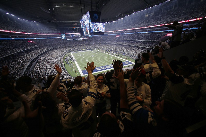 AP photo by Roger Steinman / The Dallas Cowboys host the Seattle Seahawks in an NFC wild-card playoff game Jan. 5 in Arlington, Texas. The Cowboys are among the teams who plan to have fans at their games when the 2020 season kicks off this month.