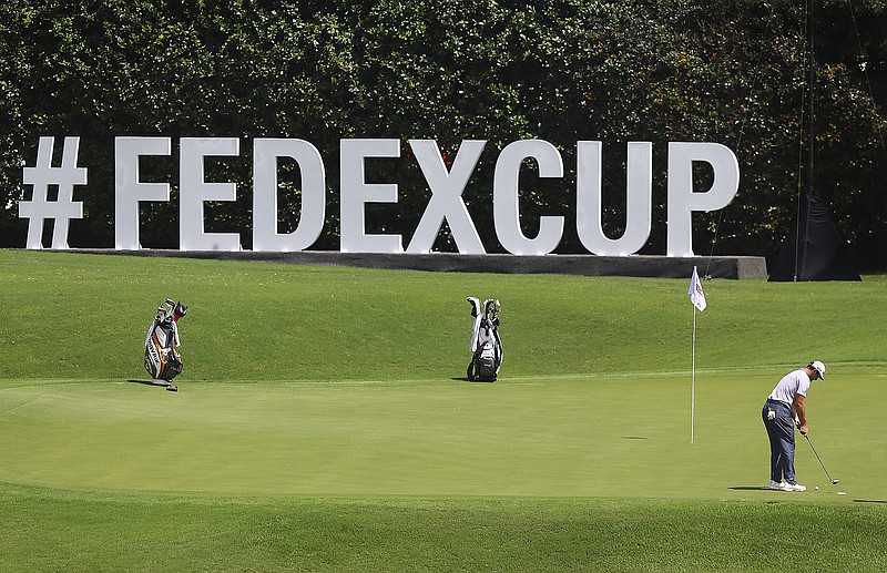 AP photo by Curtis Compton / Jon Rahm, ranked second behind Dustin Johnson in FedEx Cup points, putts on the 11th green at Atlanta's East Lake Golf Club during his practice round Wednesday ahead of the PGA Tour's season-ending Tour Championship, which tees off Friday.