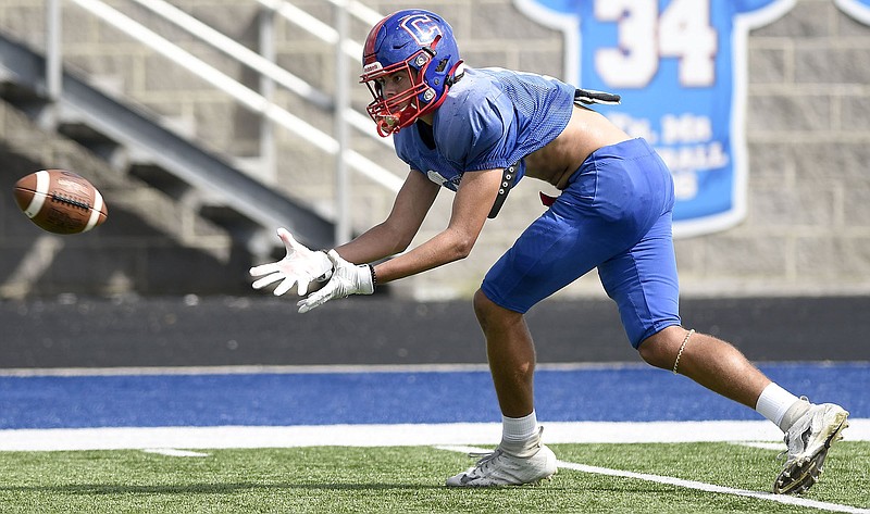 Staff photo by Robin Rudd / Cleveland junior Destun Thomas catches a pass during practice Wednesday. Thomas, a wide receiver and defensive back, has been a leading player on both sides of the ball for the Blue Raiders in the first two games of the season.