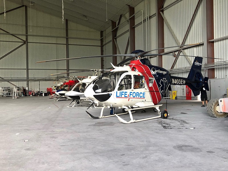 Contributed photo by Erlanger Health System / Life Force 1 in the hangar with other Global Medical Response helicopters assist with relief efforts from recent hurricanes.