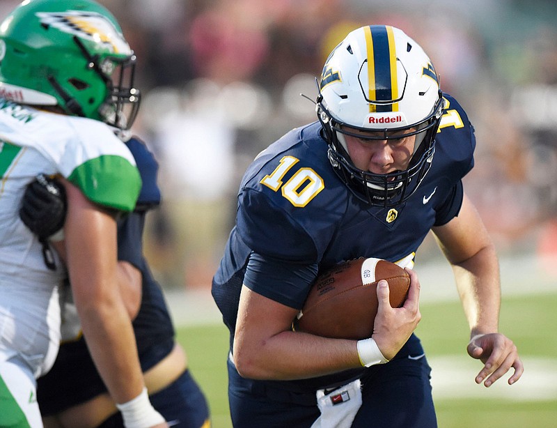 Staff Photo by Robin Rudd / Walker County quarterback Tucker Pope (10) scores his second touchdown. The Walker Valley Mustangs visited the Rhea County Golden Eagles in TSSAA football action on September 4, 2020.