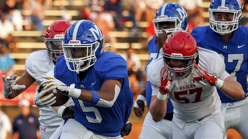 Staff photo by C.B. Schmelter / McCallie's B.J. Harris carries the ball during Friday night's home game against Brentwood Academy. McCallie, the reigning state champion, lost 30-27 in the Division II-AAA East Region opener for both teams.